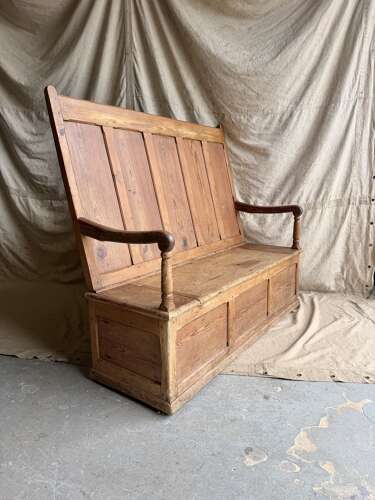 A Welsh antique 19th century pitch pine box settle