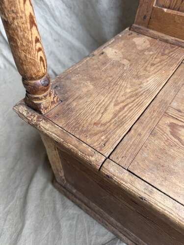 A Welsh antique 19th century pitch pine box settle
