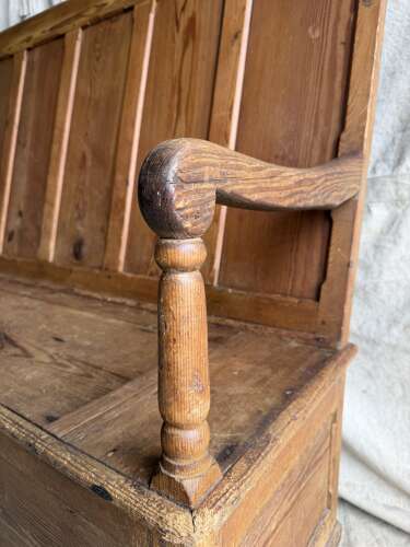 A Welsh antique 19th century pitch pine box settle