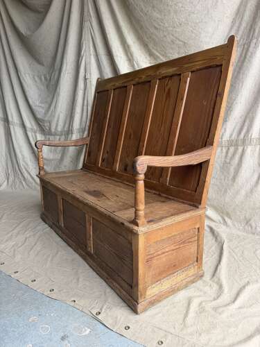 A Welsh antique 19th century pitch pine box settle