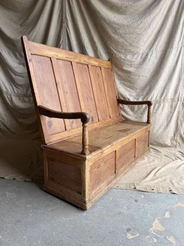 A Welsh antique 19th century pitch pine box settle