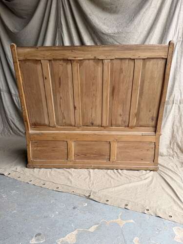 A Welsh antique 19th century pitch pine box settle