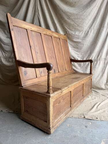 A Welsh antique 19th century pitch pine box settle