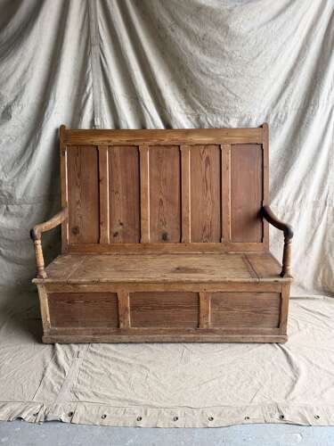 A Welsh antique 19th century pitch pine box settle