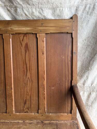 A Welsh antique 19th century pitch pine box settle
