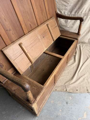 A Welsh antique 19th century pitch pine box settle