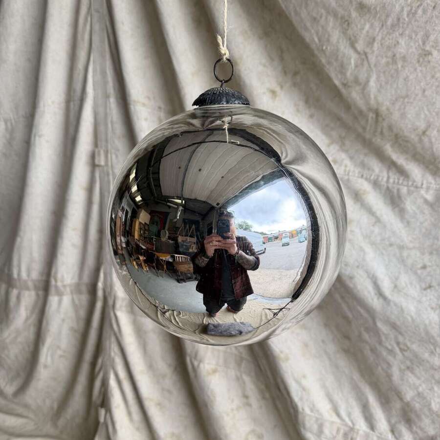 A large antique 19th century mercury glass witch ball