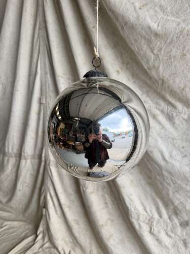 A large antique 19th century mercury glass witch ball