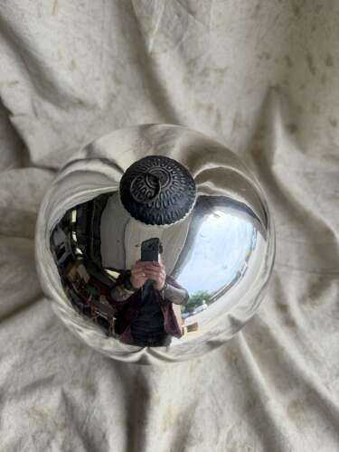A large antique 19th century mercury glass witch ball