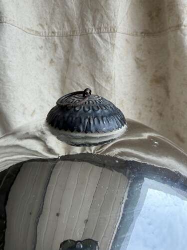 A large antique 19th century mercury glass witch ball