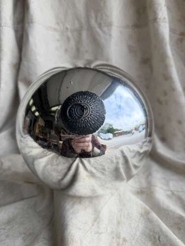 A large antique 19th century mercury glass witch ball