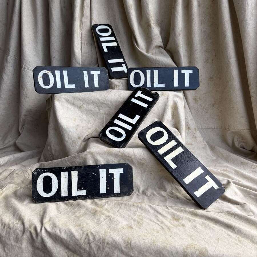 A 1920s antique hand painted wooden workshop oil it sign