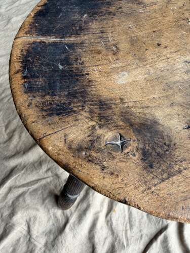 An antique early 20th century Welsh pole lathe turned dairy stool Xmas 1911