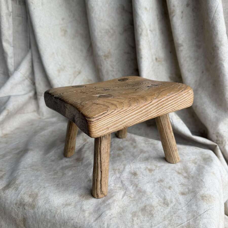 A Georgian antique elm candle stool