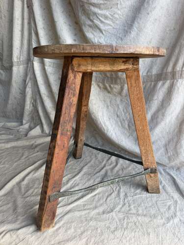 An antique Irish late 19th century elm cricket table