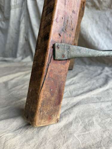 An antique Irish late 19th century elm cricket table