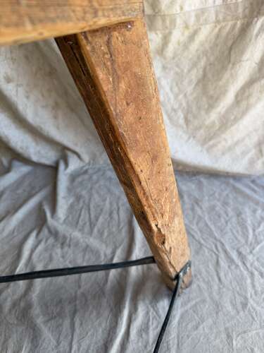 An antique Irish late 19th century elm cricket table