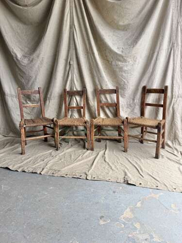 A rare set of four 19th century antique Irish Sugan chairs